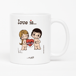 Load image into Gallery viewer, Front view: Love is... a gift personalized ceramic mug by Kim Casali. 
