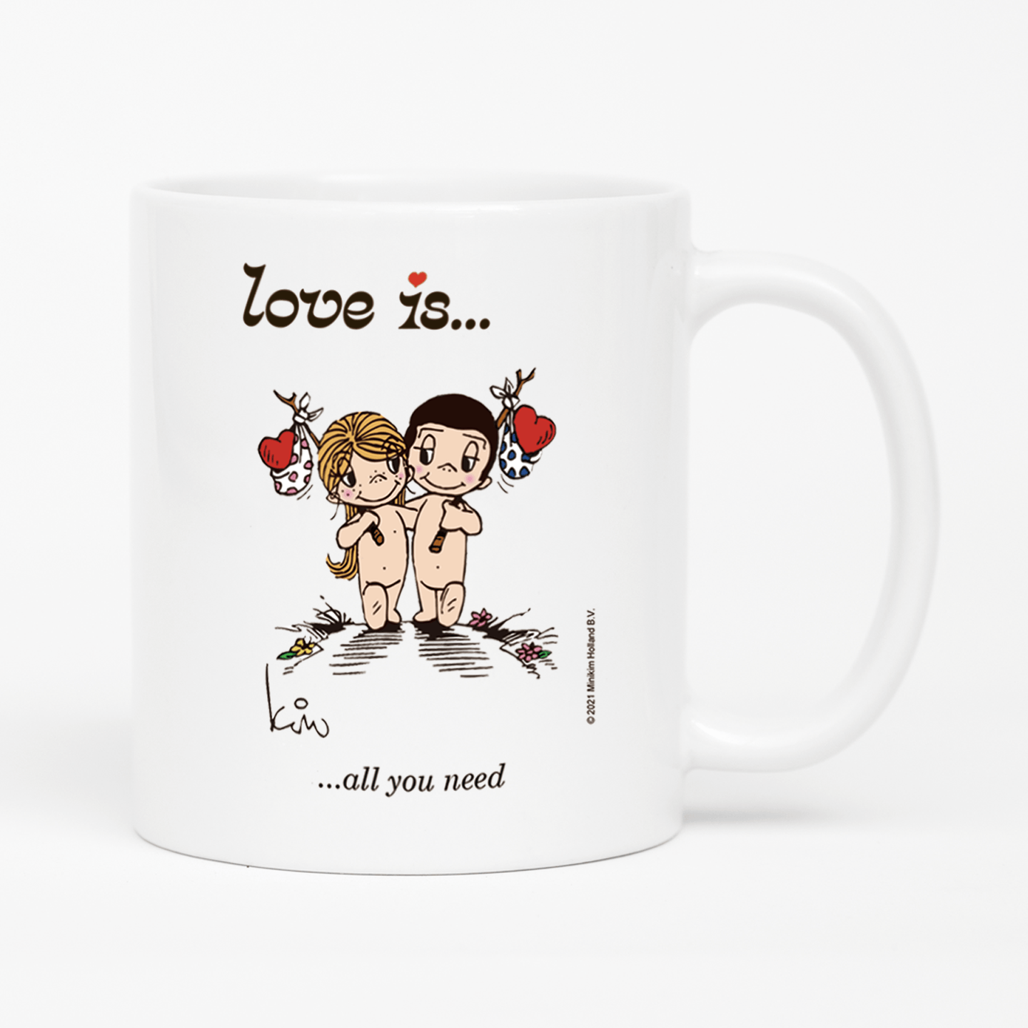 Front view: Love is... all you need  personalized ceramic mug by Kim Casali. 