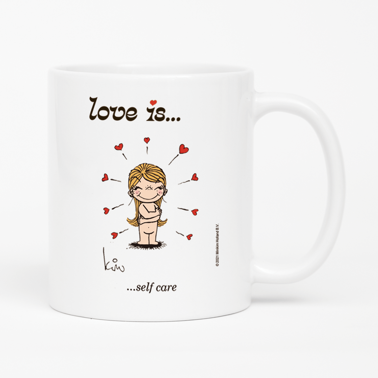 Front view: Love is... self care personalized ceramic mug by Kim Casali.