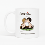 Load image into Gallery viewer, Love is... sharing a slow smooch  personalized ceramic mug by Kim Casali. 
