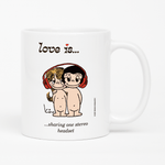 Load image into Gallery viewer, Front view: Love is... sharing one stereo headset  personalized ceramic mug by Kim Casali. 
