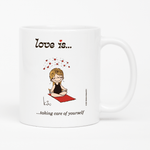 Load image into Gallery viewer, Front view: Love is... taking care of yourself  personalized ceramic mug by Kim Casali. 
