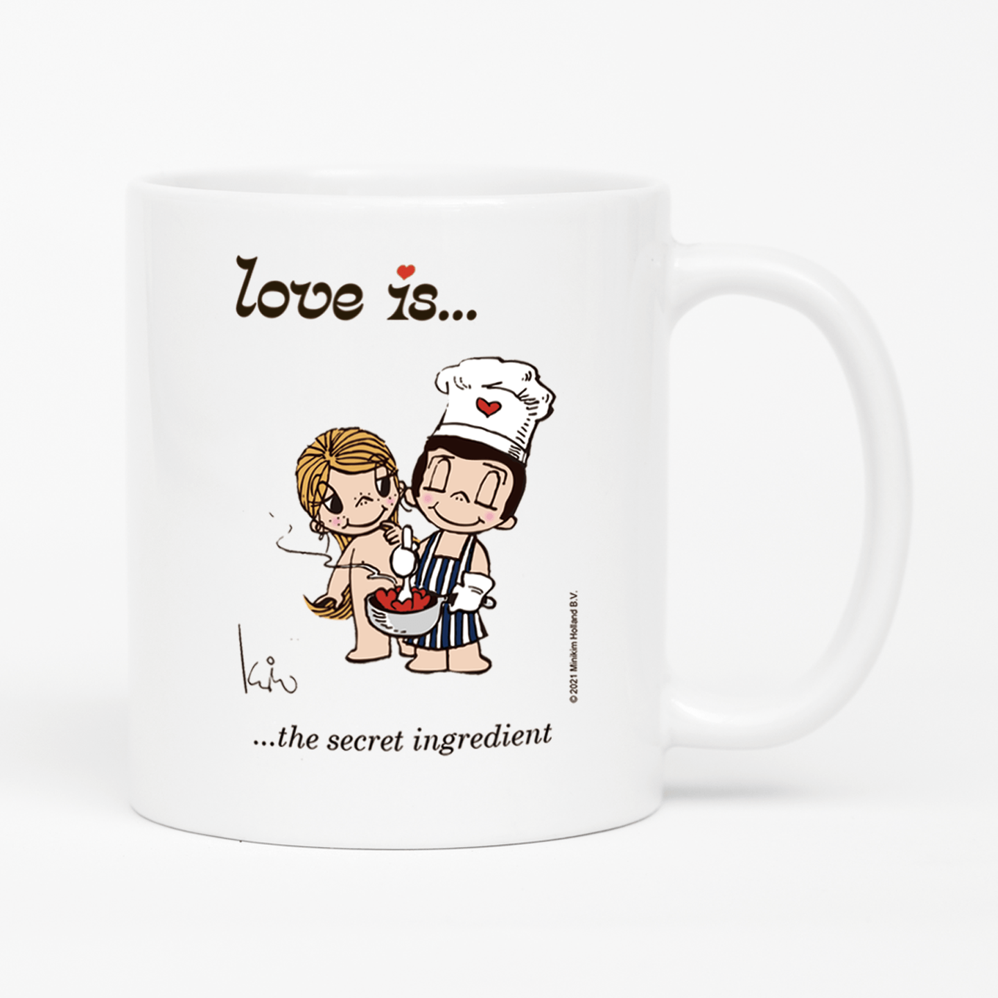 Front view: Love is... the secret ingredient personalized ceramic mug by Kim Casali.